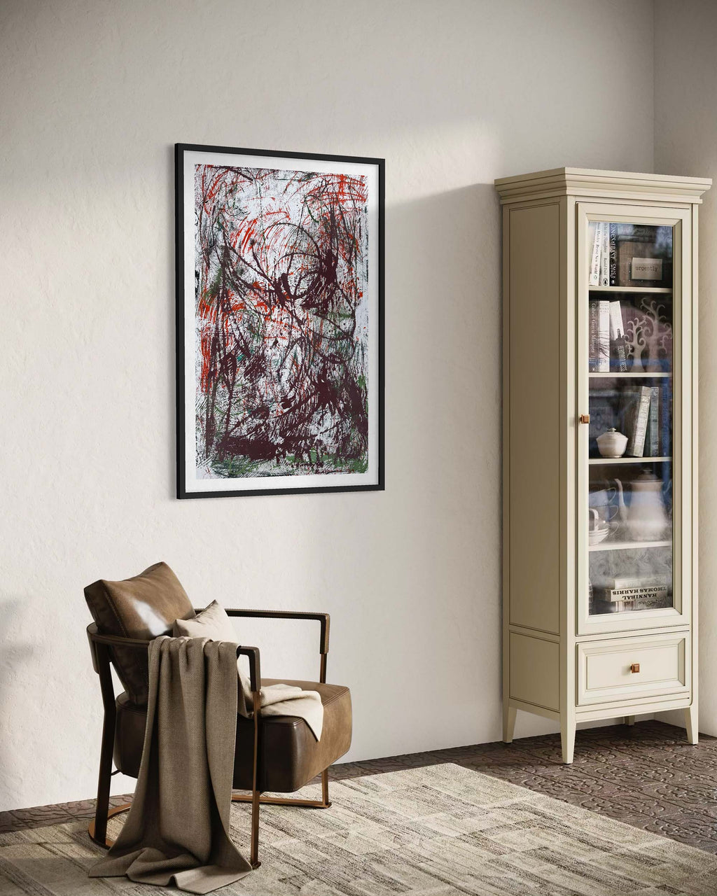 Living room with a chair, abstract painting on the wall, and a bookshelf.