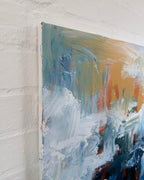 Abstract painting on a textured white wall